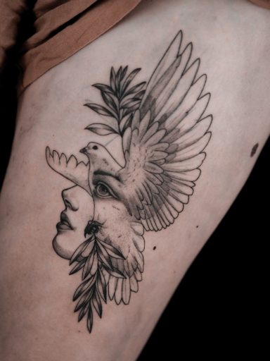 surrealistic woman portrait with dove tattoo on thigh, done in Lörrach